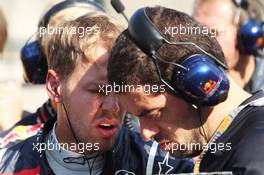 (L to R): Sebastian Vettel (GER) Red Bull Racing with Guillaume Rocquelin  (ITA) Red Bull Racing Race Engineer on the grid. 07.10.2012. Formula 1 World Championship, Rd 15, Japanese Grand Prix, Suzuka, Japan, Race Day.