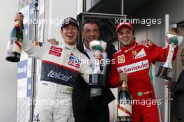 (L to R): Kamui Kobayashi (JPN) Sauber celebrates his third position on the podium with Jean Alesi (FRA) and second placed Felipe Massa (BRA) Ferrari. 07.10.2012. Formula 1 World Championship, Rd 15, Japanese Grand Prix, Suzuka, Japan, Race Day.