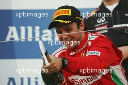 Second placed Felipe Massa (BRA) Ferrari suffers from premature champagne elation on the podium. 07.10.2012. Formula 1 World Championship, Rd 15, Japanese Grand Prix, Suzuka, Japan, Race Day.