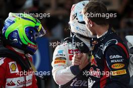 Kamui Kobayashi (JPN) Sauber celebrates his third position in parc ferme with race winner Sebastian Vettel (GER) Red Bull Racing and Felipe Massa (BRA) Ferrari. 07.10.2012. Formula 1 World Championship, Rd 15, Japanese Grand Prix, Suzuka, Japan, Race Day.