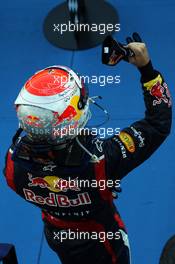 RACE WINNER Sebastian Vettel (GER) Red Bull Racing celebrates in parc ferme. 07.10.2012. Formula 1 World Championship, Rd 15, Japanese Grand Prix, Suzuka, Japan, Race Day.