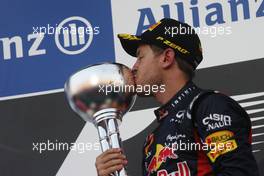 Race winner Sebastian Vettel (GER) Red Bull Racing celebrates on the podium. 07.10.2012. Formula 1 World Championship, Rd 15, Japanese Grand Prix, Suzuka, Japan, Race Day.