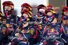 Red Bull Racing mechanics watch the race. 07.10.2012. Formula 1 World Championship, Rd 15, Japanese Grand Prix, Suzuka, Japan, Race Day.