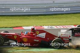 Fernando Alonso (ESP) Ferrari F2012 crashes out at the start of the race. 07.10.2012. Formula 1 World Championship, Rd 15, Japanese Grand Prix, Suzuka, Japan, Race Day.