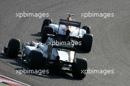 Michael Schumacher (GER), Mercedes GP and Paul di Resta (GBR), Sahara Force India Formula One Team  07.10.2012. Formula 1 World Championship, Rd 15, Japanese Grand Prix, Suzuka, Japan, Race Day