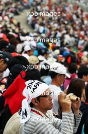 Fans watch qualifying. 06.10.2012. Formula 1 World Championship, Rd 15, Japanese Grand Prix, Suzuka, Japan, Qualifying Day.