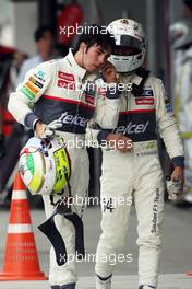 (L to R): Sergio Perez (MEX) Sauber and team mate Kamui Kobayashi (JPN) Sauber in parc ferme. 06.10.2012. Formula 1 World Championship, Rd 15, Japanese Grand Prix, Suzuka, Japan, Qualifying Day.