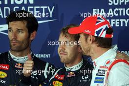 Qualifying parc ferme (L to R): Mark Webber (AUS) Red Bull Racing, second; Sebastian Vettel (GER) Red Bull Racing, pole position; Jenson Button (GBR) McLaren, third. 06.10.2012. Formula 1 World Championship, Rd 15, Japanese Grand Prix, Suzuka, Japan, Qualifying Day.