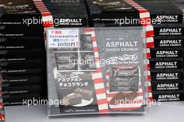 Ashphalt Choco Crunch on sale in the fans' merchandise area. 06.10.2012. Formula 1 World Championship, Rd 15, Japanese Grand Prix, Suzuka, Japan, Qualifying Day.