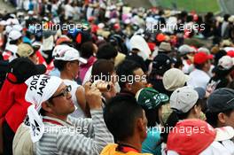 Fans watch qualifying. 06.10.2012. Formula 1 World Championship, Rd 15, Japanese Grand Prix, Suzuka, Japan, Qualifying Day.