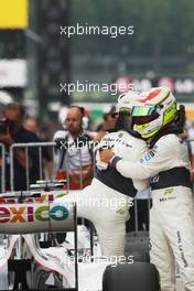 (L to R): Kamui Kobayashi (JPN) Sauber and team mate Sergio Perez (MEX) Sauber celebrate in parc ferme. 06.10.2012. Formula 1 World Championship, Rd 15, Japanese Grand Prix, Suzuka, Japan, Qualifying Day.