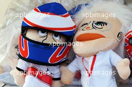 Jenson Button (GBR) McLaren and Bernie Ecclestone (GBR) CEO Formula One Group (FOM) hand puppets on sale. 06.10.2012. Formula 1 World Championship, Rd 15, Japanese Grand Prix, Suzuka, Japan, Qualifying Day.