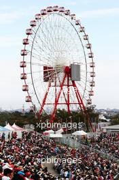 Fans in the grandstand and the ferris wheel. 06.10.2012. Formula 1 World Championship, Rd 15, Japanese Grand Prix, Suzuka, Japan, Qualifying Day.