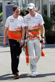 (L to R): qhi with Nico Hulkenberg (GER) Sahara Force India F1. 07.10.2012. Formula 1 World Championship, Rd 15, Japanese Grand Prix, Suzuka, Japan, Race Day.