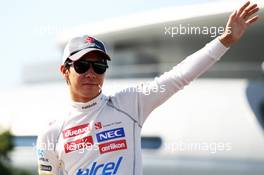 Kamui Kobayashi (JPN) Sauber on the drivers parade. 07.10.2012. Formula 1 World Championship, Rd 15, Japanese Grand Prix, Suzuka, Japan, Race Day.