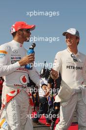 (L to R): Lewis Hamilton (GBR) McLaren with Nico Rosberg (GER) Mercedes AMG F1 on the drivers parade. 07.10.2012. Formula 1 World Championship, Rd 15, Japanese Grand Prix, Suzuka, Japan, Race Day.