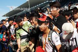 McLaren fans at the pit lane walkabout. 04.10.2012. Formula 1 World Championship, Rd 15, Japanese Grand Prix, Suzuka, Japan, Preparation Day.