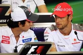 (L to R): Sergio Perez (MEX) Sauber and Jenson Button (GBR) McLaren in the FIA Press Conference. 04.10.2012. Formula 1 World Championship, Rd 15, Japanese Grand Prix, Suzuka, Japan, Preparation Day.