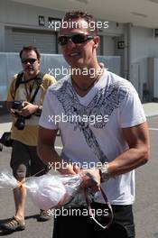 A gift from a Japanese fan for Michael Schumacher (GER), Mercedes AMG Petronas  04.10.2012. Formula 1 World Championship, Rd 15, Japanese Grand Prix, Suzuka, Japan, Preparation Day