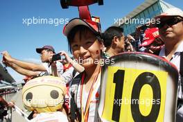 A McLaren fan at the pit lane walkabout. 04.10.2012. Formula 1 World Championship, Rd 15, Japanese Grand Prix, Suzuka, Japan, Preparation Day.