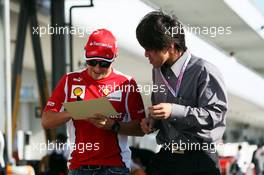 Felipe Massa (BRA) Ferrari signs autographs for the fans. 04.10.2012. Formula 1 World Championship, Rd 15, Japanese Grand Prix, Suzuka, Japan, Preparation Day.