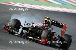 Romain Grosjean (FRA) Lotus F1 E20 locks up under braking. 12.10.2012. Formula 1 World Championship, Rd 16, Korean Grand Prix, Yeongam, South Korea, Practice Day.
