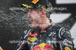 Race winner Sebastian Vettel (GER) Red Bull Racing celebrates on the podium. 14.10.2012. Formula 1 World Championship, Rd 16, Korean Grand Prix, Yeongam, South Korea, Race Day.