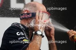 Adrian Newey (GBR) Red Bull Racing Chief Technical Officer celebrates on the podium. 14.10.2012. Formula 1 World Championship, Rd 16, Korean Grand Prix, Yeongam, South Korea, Race Day.