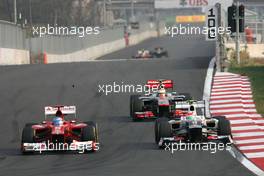 Fernando Alonso (ESP), Scuderia Ferrari and Sergio Perez (MEX), Sauber F1 Team  14.10.2012. Formula 1 World Championship, Rd 16, Korean Grand Prix, Yeongam, Korea, Race Day