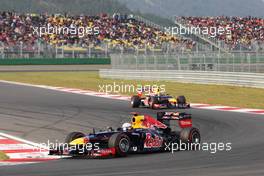 Sebastian Vettel (GER) Red Bull Racing RB8 leads team mate Mark Webber (AUS) Red Bull Racing RB8. 14.10.2012. Formula 1 World Championship, Rd 16, Korean Grand Prix, Yeongam, South Korea, Race Day.