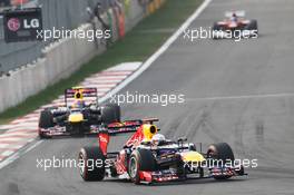 Sebastian Vettel (GER) Red Bull Racing RB8 leads team mate Mark Webber (AUS) Red Bull Racing RB8. 14.10.2012. Formula 1 World Championship, Rd 16, Korean Grand Prix, Yeongam, South Korea, Race Day.