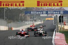 Fernando Alonso (ESP), Scuderia Ferrari and Sergio Perez (MEX), Sauber F1 Team  14.10.2012. Formula 1 World Championship, Rd 16, Korean Grand Prix, Yeongam, Korea, Race Day