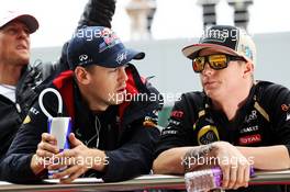 (L to R): Sebastian Vettel (GER) Red Bull Racing and Kimi Raikkonen (FIN) Lotus F1 Team on the drivers parade. 14.10.2012. Formula 1 World Championship, Rd 16, Korean Grand Prix, Yeongam, South Korea, Race Day.