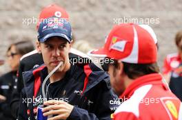 (L to R): Sebastian Vettel (GER) Red Bull Racing with Fernando Alonso (ESP) Ferrari. 14.10.2012. Formula 1 World Championship, Rd 16, Korean Grand Prix, Yeongam, South Korea, Race Day.