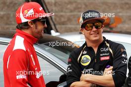 (L to R): Fernando Alonso (ESP) Ferrari with Kimi Raikkonen (FIN) Lotus F1 Team. 14.10.2012. Formula 1 World Championship, Rd 16, Korean Grand Prix, Yeongam, South Korea, Race Day.