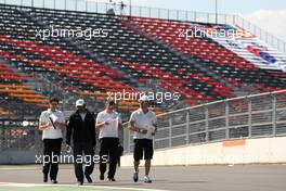Narain Karthikeyan (IND), HRT Formula One Team and Dani Clos (ESP), HRT Formula One Team  11.10.2012. Formula 1 World Championship, Rd 16, Korean Grand Prix, Yeongam, Korea, Preparation Day
