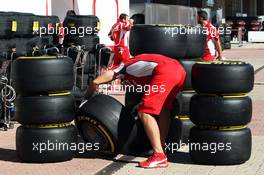 Ferrari mechanic with Pirelli tyres. 11.10.2012. Formula 1 World Championship, Rd 16, Korean Grand Prix, Yeongam, South Korea, Preparation Day.