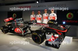 01.02.2012 Woking, England,  Gary Paffet (GBR) tesst driver, Lewis Hamilton (GBR), McLaren Mercedes and Jenson Button (GBR), McLaren Mercedes - Vodafone McLaren Mercedes MP4-27 launch, McLaren Technology Centre, Oliver Turvey