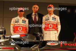 01.02.2012 Woking, England,  Lewis Hamilton (GBR), McLaren Mercedes, Martin Whitmarsh (GBR), McLaren, Chief Executive Officer and Jenson Button (GBR), McLaren Mercedes - Vodafone McLaren Mercedes MP4-27 launch, McLaren Technology Centre