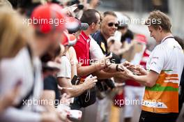 Nico Hulkenberg (GER) Sahara Force India F1 signs autographs for the fans. 25.05.2012. Formula 1 World Championship, Rd 6, Monaco Grand Prix, Monte Carlo, Monaco, Friday