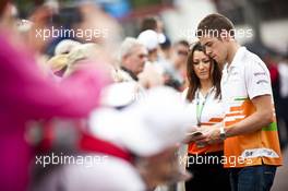 Paul di Resta (GBR) Sahara Force India F1 signs autographs for the fans. 25.05.2012. Formula 1 World Championship, Rd 6, Monaco Grand Prix, Monte Carlo, Monaco, Friday