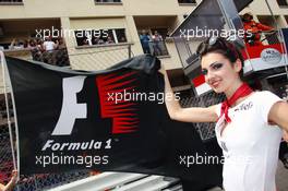 Grid girl with the F1 flag. 27.05.2012. Formula 1 World Championship, Rd 6, Monaco Grand Prix, Monte Carlo, Monaco, Race Day