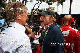 (L to R): Eddie Jordan (IRE) BBC Television Pundit with Ron Howard (USA) Film Director on the grid. 27.05.2012. Formula 1 World Championship, Rd 6, Monaco Grand Prix, Monte Carlo, Monaco, Race Day