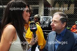 (L to R): Marion Jolles (FRA) TF1 TV Presenter with Jean Todt (FRA) FIA President on the grid. 27.05.2012. Formula 1 World Championship, Rd 6, Monaco Grand Prix, Monte Carlo, Monaco, Race Day
