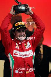 Fernando Alonso (ESP) Ferrari celebrates his third position on the podium. 27.05.2012. Formula 1 World Championship, Rd 6, Monaco Grand Prix, Monte Carlo, Monaco, Race Day