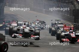 Kamui Kobayashi (JPN) Sauber C31 flies through the air at the start of the race as he crashed with Romain Grosjean (FRA) Lotus F1 E20. 27.05.2012. Formula 1 World Championship, Rd 6, Monaco Grand Prix, Monte Carlo, Monaco, Race Day