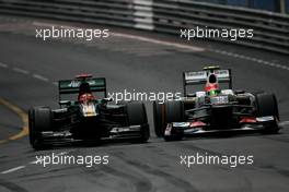 Heikki Kovalainen (FIN), Caterham F1 Team and Sergio Perez (MEX), Sauber F1 Team  27.05.2012. Formula 1 World Championship, Rd 6, Monaco Grand Prix, Monte Carlo, Monaco, Sunday