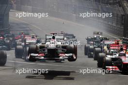 Kamui Kobayashi (JPN) Sauber C31 flies through the air at the start of the race as he crashed with Romain Grosjean (FRA) Lotus F1 E20. 27.05.2012. Formula 1 World Championship, Rd 6, Monaco Grand Prix, Monte Carlo, Monaco, Race Day