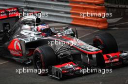 Heikki Kovalainen (FIN), Caterham F1 Team and Jenson Button (GBR), McLaren Mercedes crash at turn 1 27.05.2012. Formula 1 World Championship, Rd 6, Monaco Grand Prix, Monte Carlo, Monaco, Sunday