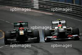 Heikki Kovalainen (FIN), Caterham F1 Team and Sergio Perez (MEX), Sauber F1 Team  27.05.2012. Formula 1 World Championship, Rd 6, Monaco Grand Prix, Monte Carlo, Monaco, Sunday
